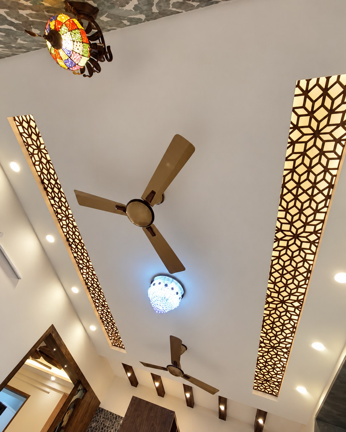Decorative ceiling with warm geometric light panels